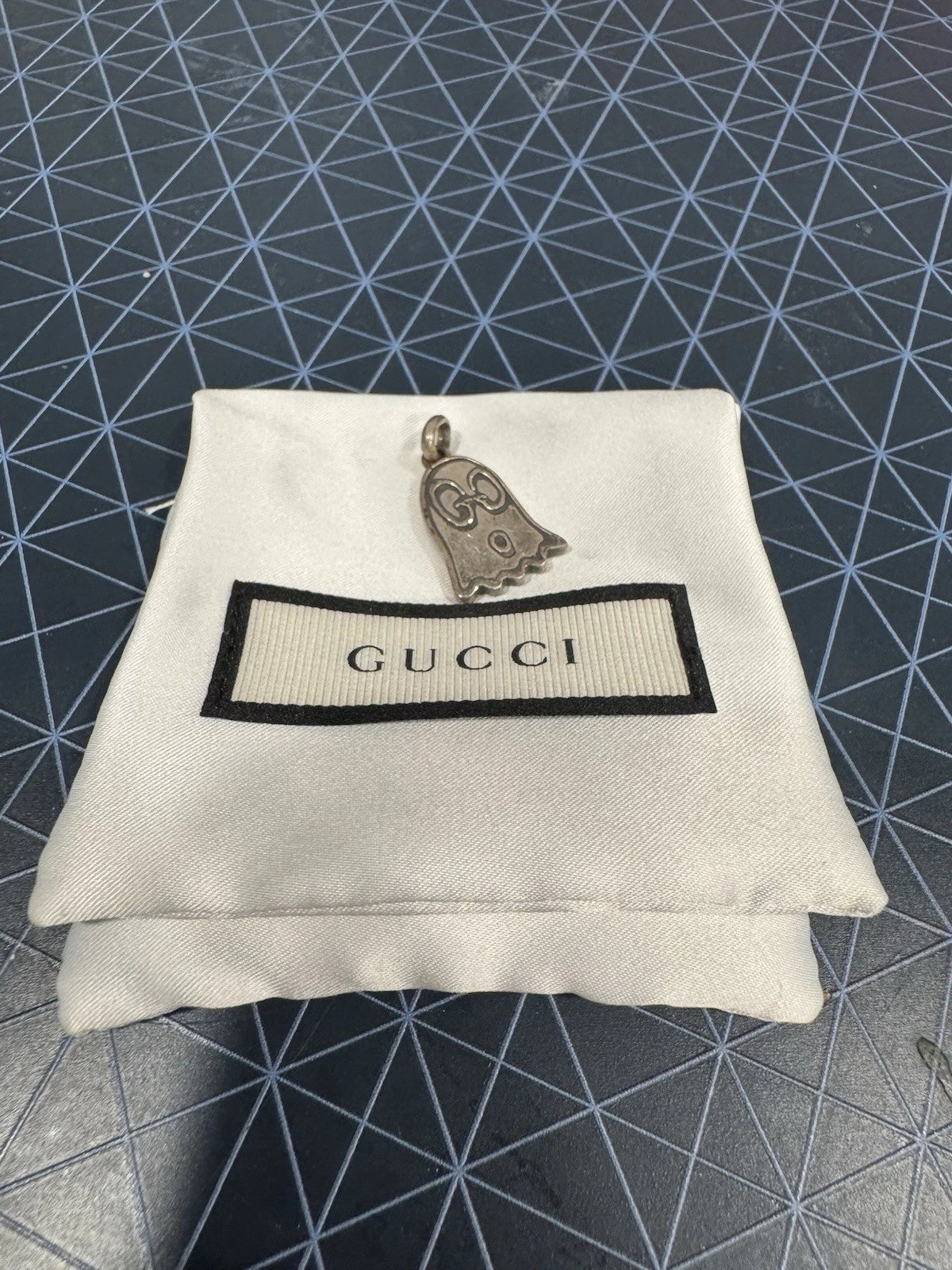 Gucci ciondolo fantasma top argento uomo