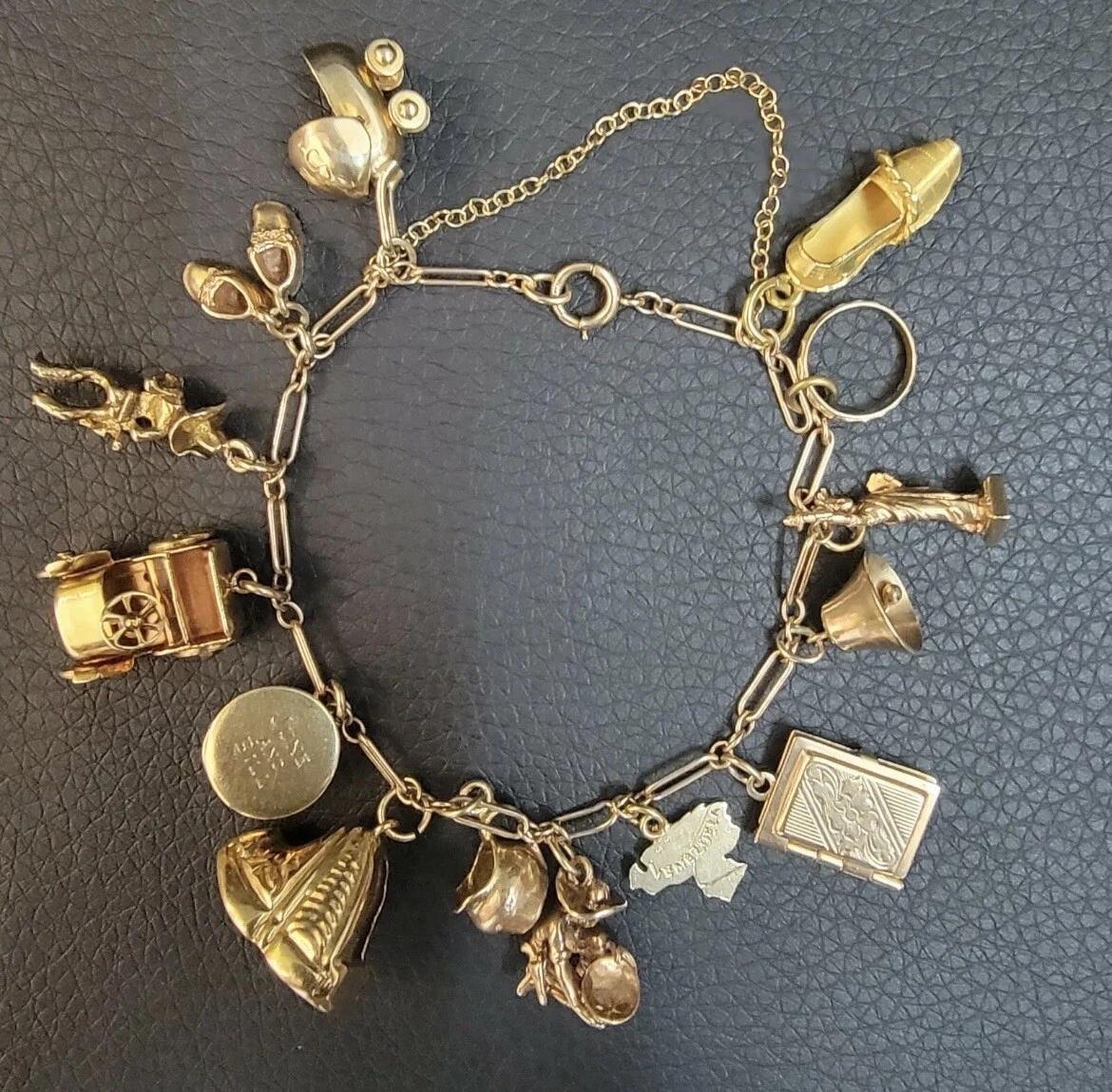 14 Karat Yellow Gold Charm Bracelet with 7 Cat Charms