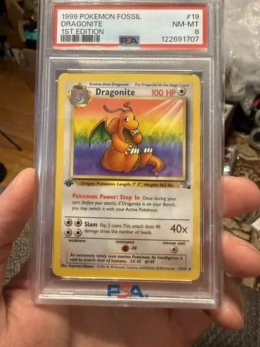 1999 POKEMON TCG FOSSIL #19 DRAGONITE 1ST EDITION - PSA 8 NM-MT Non holo