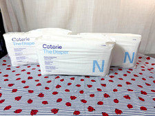 Corterie The Diaper Newborn Lot of 3 packs 10 lbs - 93 Diapers