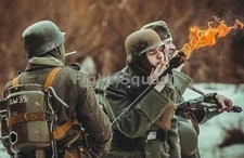 WW2 Picture Photo german soldier lighting cigarette with flamethrower 3321