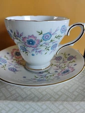 Avon Blue Blossoms Floral Fine Bone China Tea Cup & Saucer England 1974