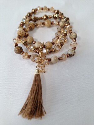 Natural Elements 3 Strand Beaded Stretch Bracelet With Tassel
