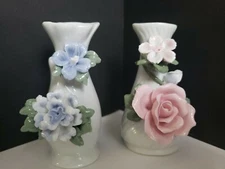 White Porcelain Bud Vases Featuring Raised Floral Bouquets. - 2 Piece Lot