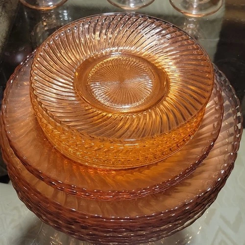 Set of 21 pink swirl depression glass plates