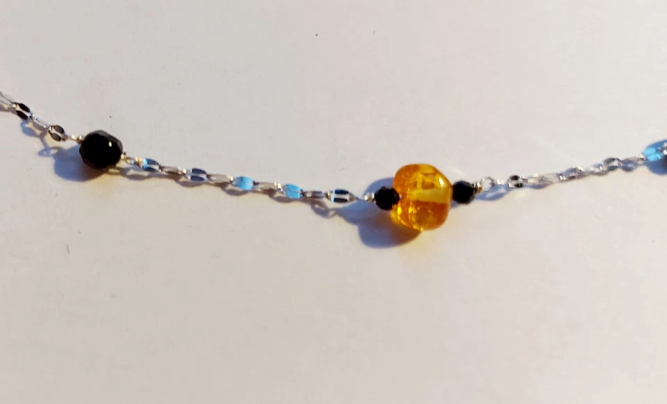 collana in argento 925 e pietre con ambra grezza naturale onice nero sfaccettato - Immagine 4 di 4