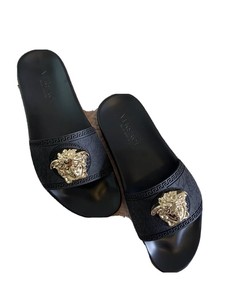 black and gold versace slides