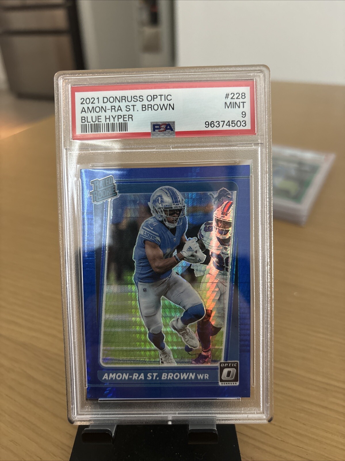2021 Donruss Optic Amon-Ra St. Brown Blue Hyper PSA 9