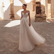 Elegant Lace Appliqued A-Line Wedding Dresses Cap Sleeves Open Back Pleat Tulle