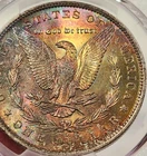 1885-O Morgan Dollar Rainbow Color Reverse Toned - PCGS MS63 35th Anniversary