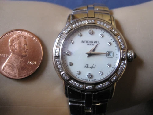 #419 ladys stainless steel 59 diamond RAYMOND WEIL quartz date watch