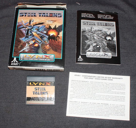Atari Lynx W. Game Cartridges, and  Carrying Case and power adapter AO4079462