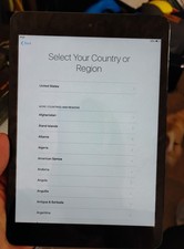 Apple iPad Series Black Tablet, iOS - Setup Screen Select Country or Region