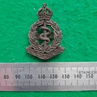 WW2 British Royal Army Medical Corps Economy Plastic Cap Badge