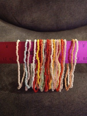 Set of 20 stretch Seed Bead bracelets And Drawstring Storage Bag.