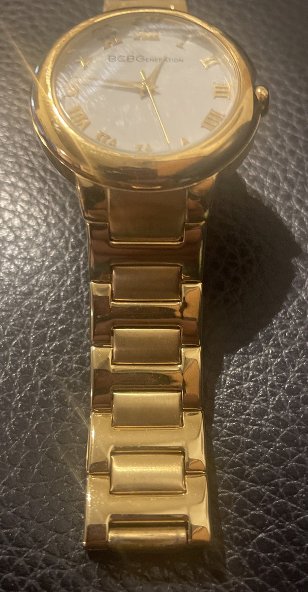 Women's BCBGeneration Gold Tone BCBG Watch some worn scraps on bracelet View 2