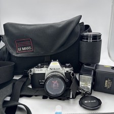 Nikon FG-20 Film Camera with Nikon Lens Series E 50mm 1:1.8 Lens Bundle