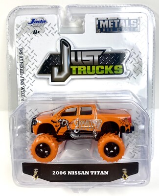 Jada Metals Diecast Just Trucks 2006 Nissan Titan Graveyard Shifters Orange 1:64