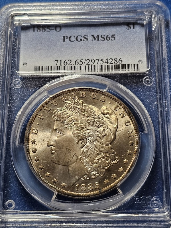 1885 O Morgan Silver Dollar PCGS MS65. Pretty Coin