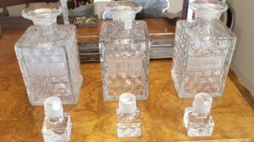 Vintage Rye Scotch Gin Decanter set in stainless holder. Great condition.