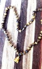 Magnifique et Long collier de perles oeil de tigre avec pendentif bouddha