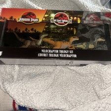 Jurassic World Jurassic Park I II and III Velociraptor Trilogy Set 3 Box Dent