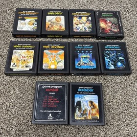 Atari 2600 System Bundle with Console, 30 Games, Joystick, Paddles, and More LOT