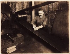 Servicing Factory Equipment c1910s Press Photo Worker Manufacturing Belt *P176c