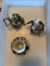 mini teapots and mini tea cup and saucer used no cracks or scratches