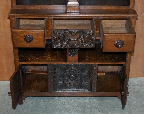 LARGE HEAVILY CARVED BOOKCASE CUPBOARD WITH ORNATE CHERUB PUTTI & LION FIGURES - Picture 11 of 12