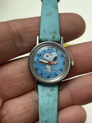 A vintage Timex 1958 Blue Snoopy wristwatch Made In Great Britain UK