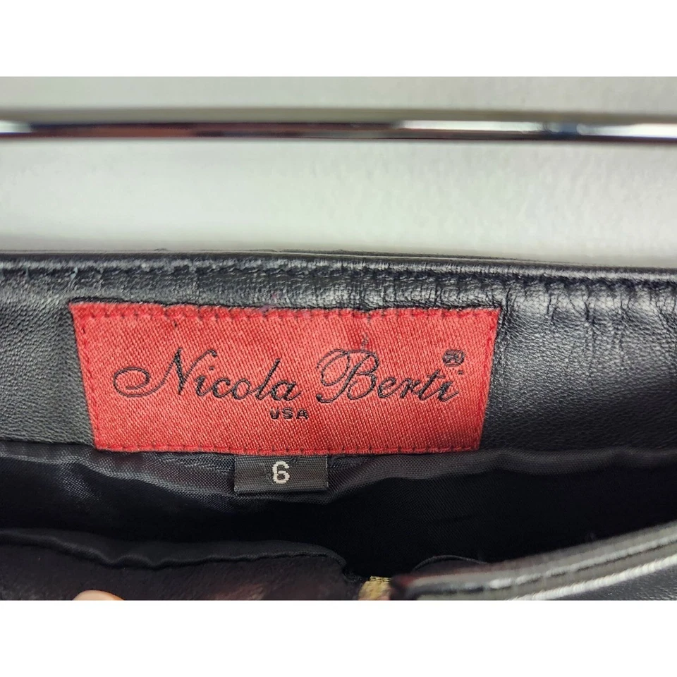 Nicola Berti США женский размер 6 Передняя молния черная кожаная короткая юбка - Изображение 2 из 4