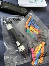 Microlet Lancing Device, plus 20 lancets exp 2026