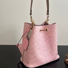 Coach Rowan Bucket Bag In Signature Canvas With Charms Powder Pink CEA23 New