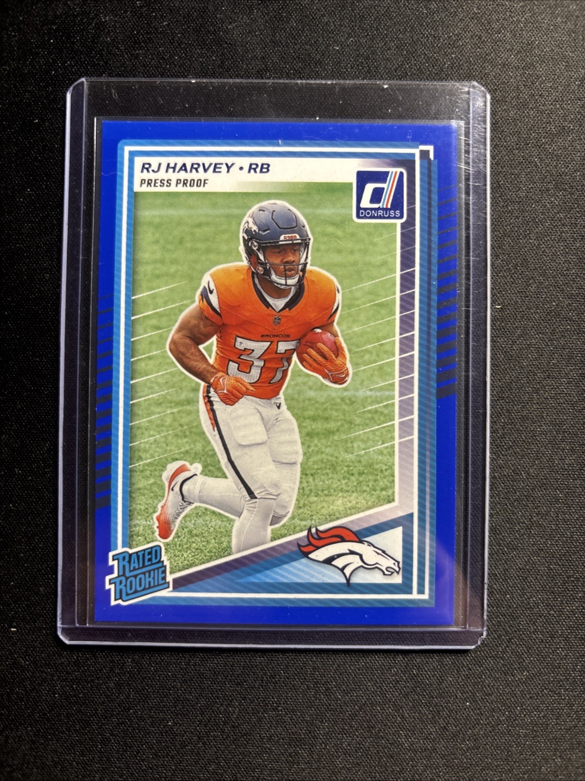 2025 Panini Donruss - Rated Rookie RJ Harvey #312 Press Proof Blue (RC)