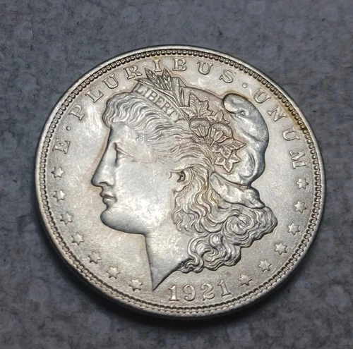 1921 Morgan Silver Dollar. Estimated Almost Uncirculated 58.M0009.