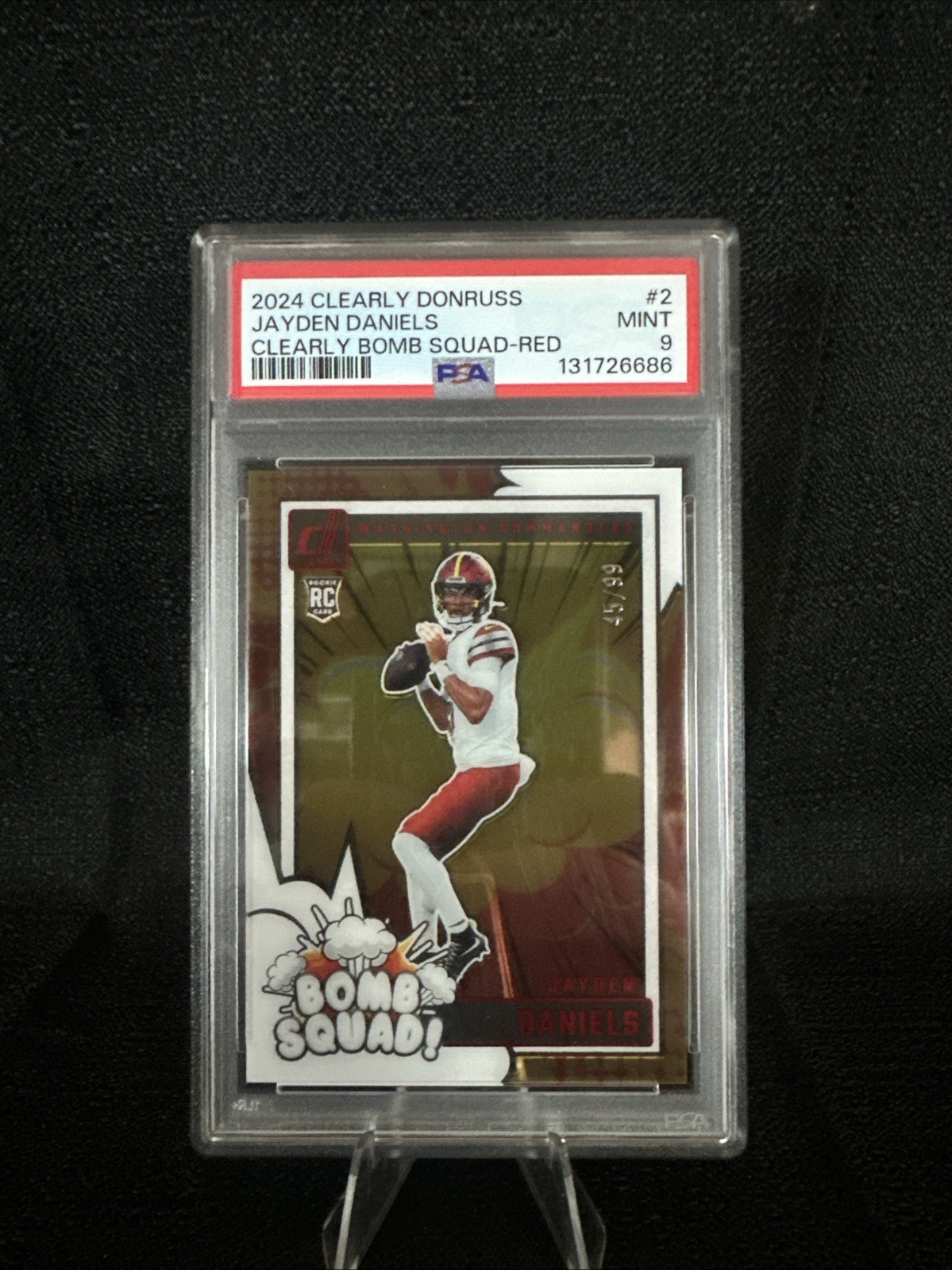2024 Panini Clearly Donruss Clearly Bomb Squad Jayden Daniels #2 Red /99 Mint 9