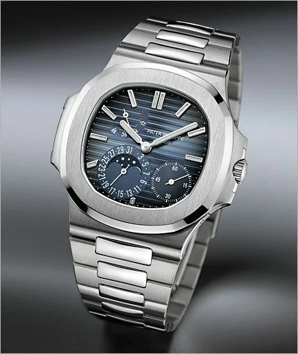 Patek Philippe Nautilus Moon Phase Stainless Steel/ Blue Date Dial (Ref#5712/1A-001)