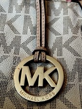 Michael Kors Gold Tone Leather Bag Charm Loop Purse Round MK Logo Hang Tag Fob