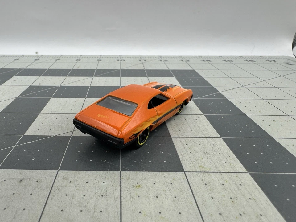 2010 Hot Wheels Dixie Challenger HW Main Street '11 Series #T9872 orange 1:64 - Image 3 of 4