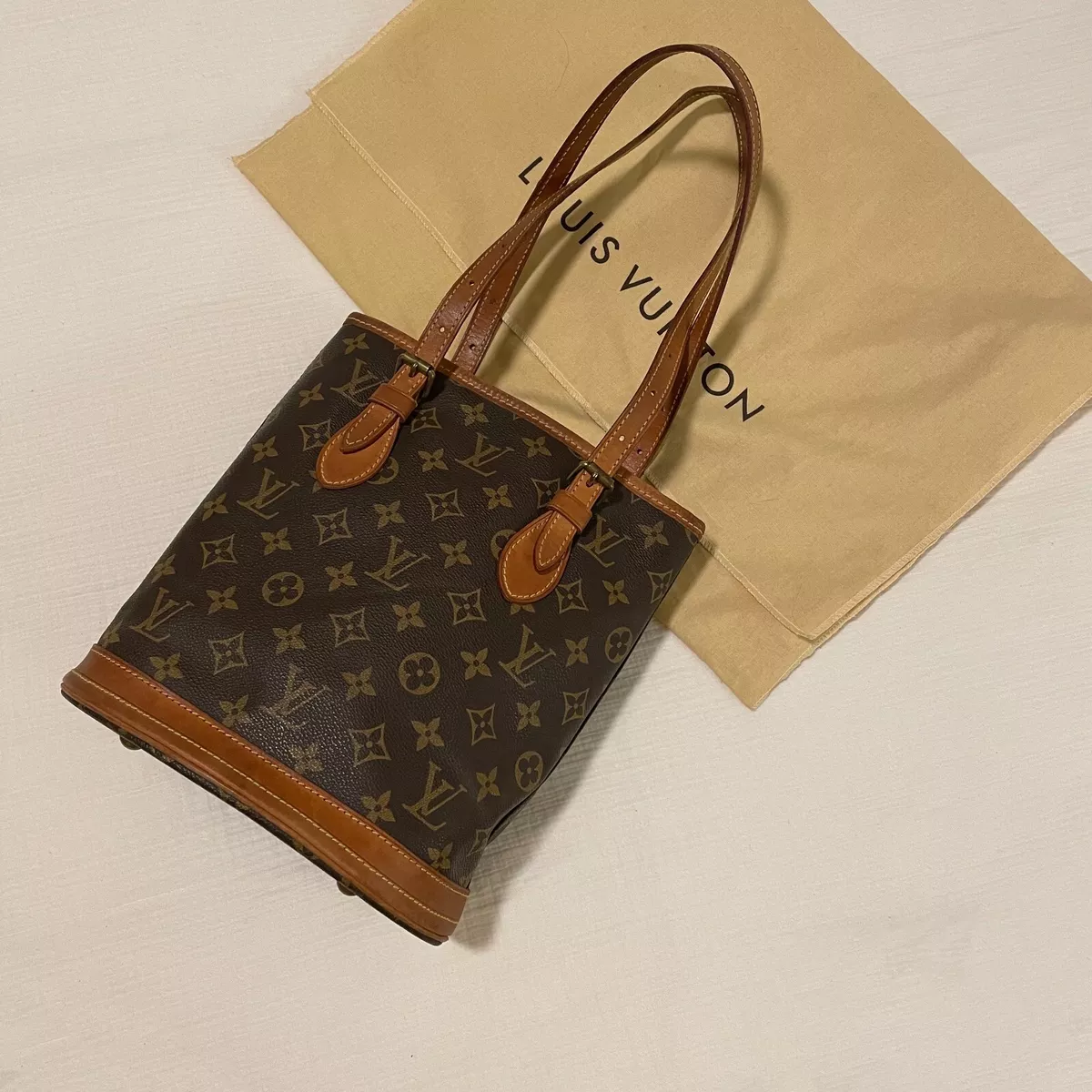 Authentic Louis Vuitton Monogram Petit Bucket