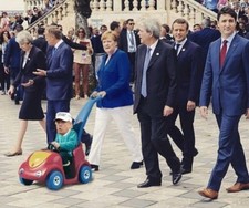 ANGELA MERKEL PUSHING TRUMP IN BABY TOY AT G7 HUMOUROUS FRIDGE MAGNET 5