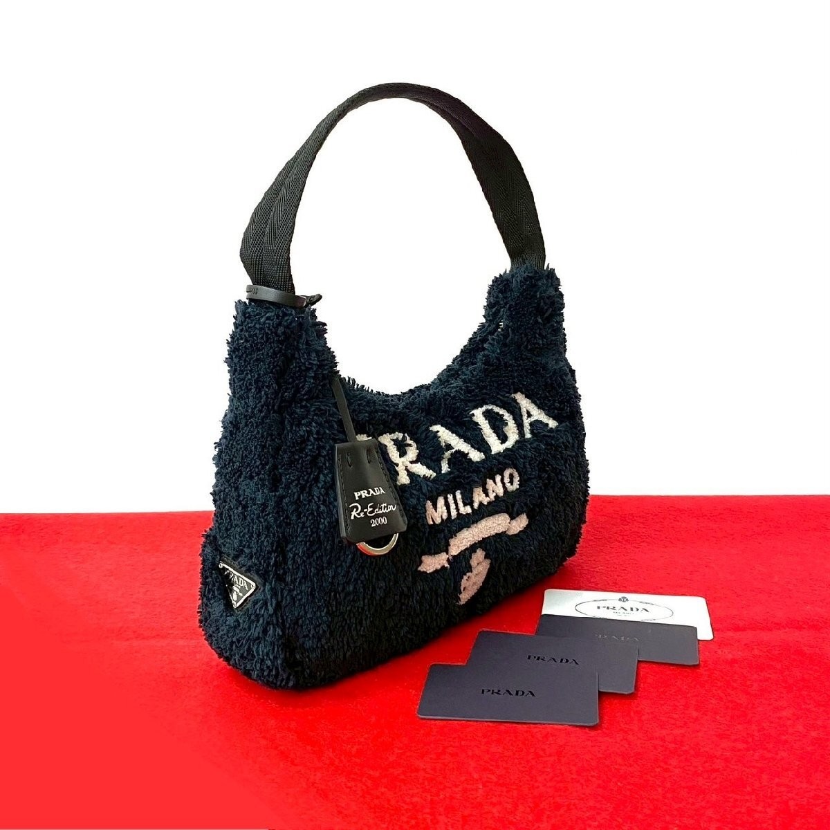 Prada ReEdition Terry Mini Triangle Hardware Pile… - image 1