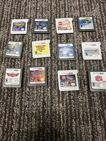 Nintendo 3DS Black, Charger, Car Charger, Stylus, And 12 Games.