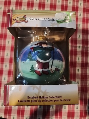 Glass Child Golf'' Christmas ornament in its packaging. This type of ornament is