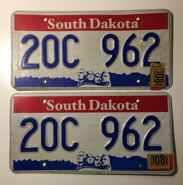 1980 South Dakota passenger car license plate sticker pair