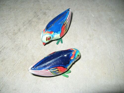 Due uccellini a molla made in China - GIOCATTOLI D'EPOCA - Foto 1 di 1
