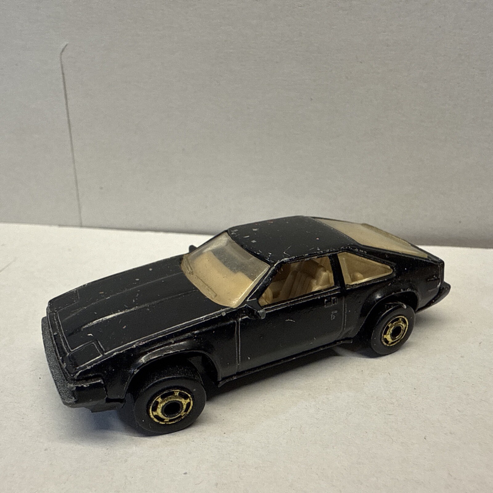 Vintage 1982 Hot Wheels Hot Ones Diecast 1/64 Black Toyota '82 Supra Gold Rims