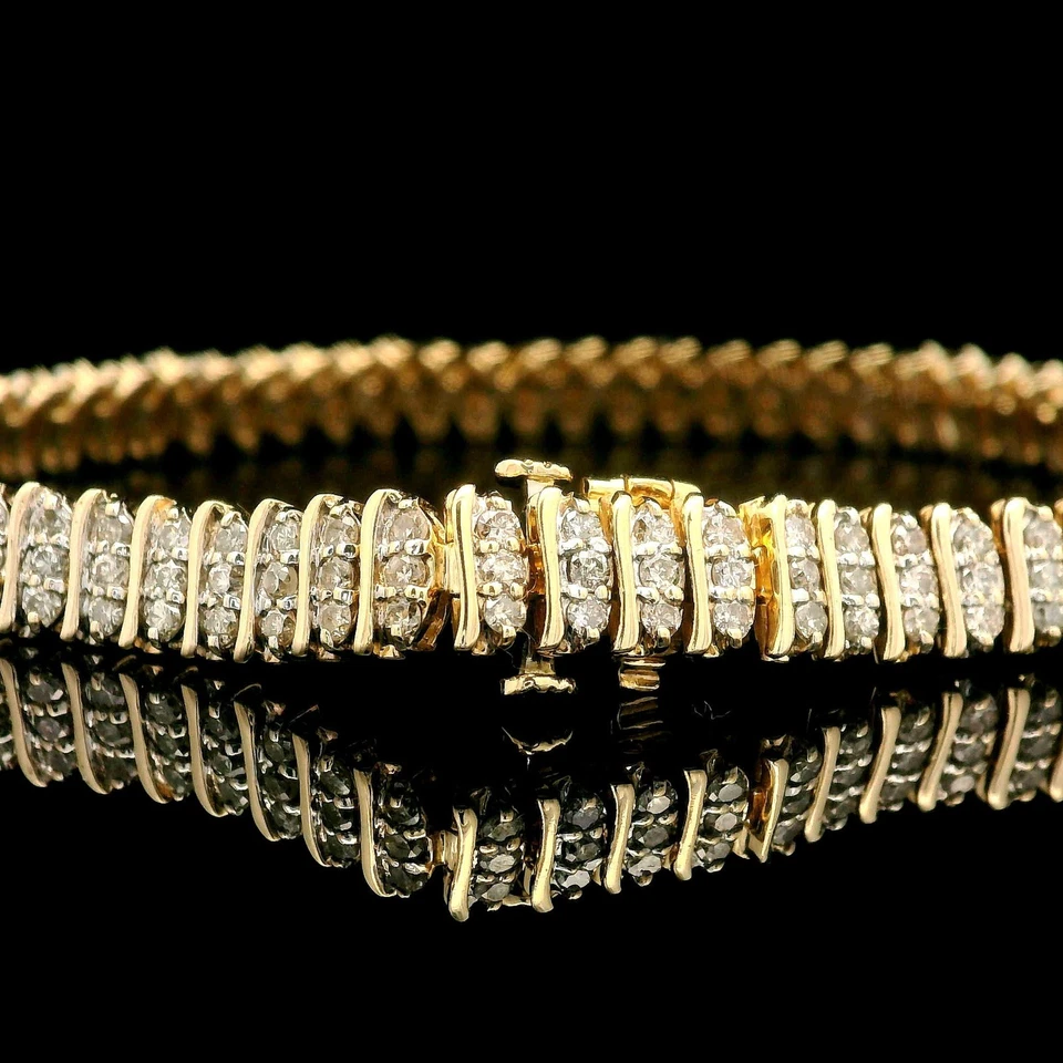 Brazalete de tenis de eslabones en S de bajo perfil de 3 filas de diamantes de oro amarillo de 14 k Foto 2 de 4
