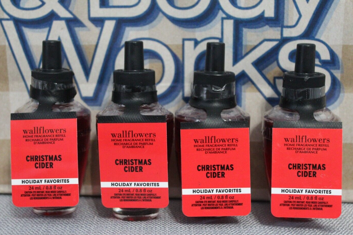 Discover the festive scent of Bath & Body Works Christmas Cider Wallflower Plug Fragrance Refill brand new and sealed for ultimate holiday ambiance-image